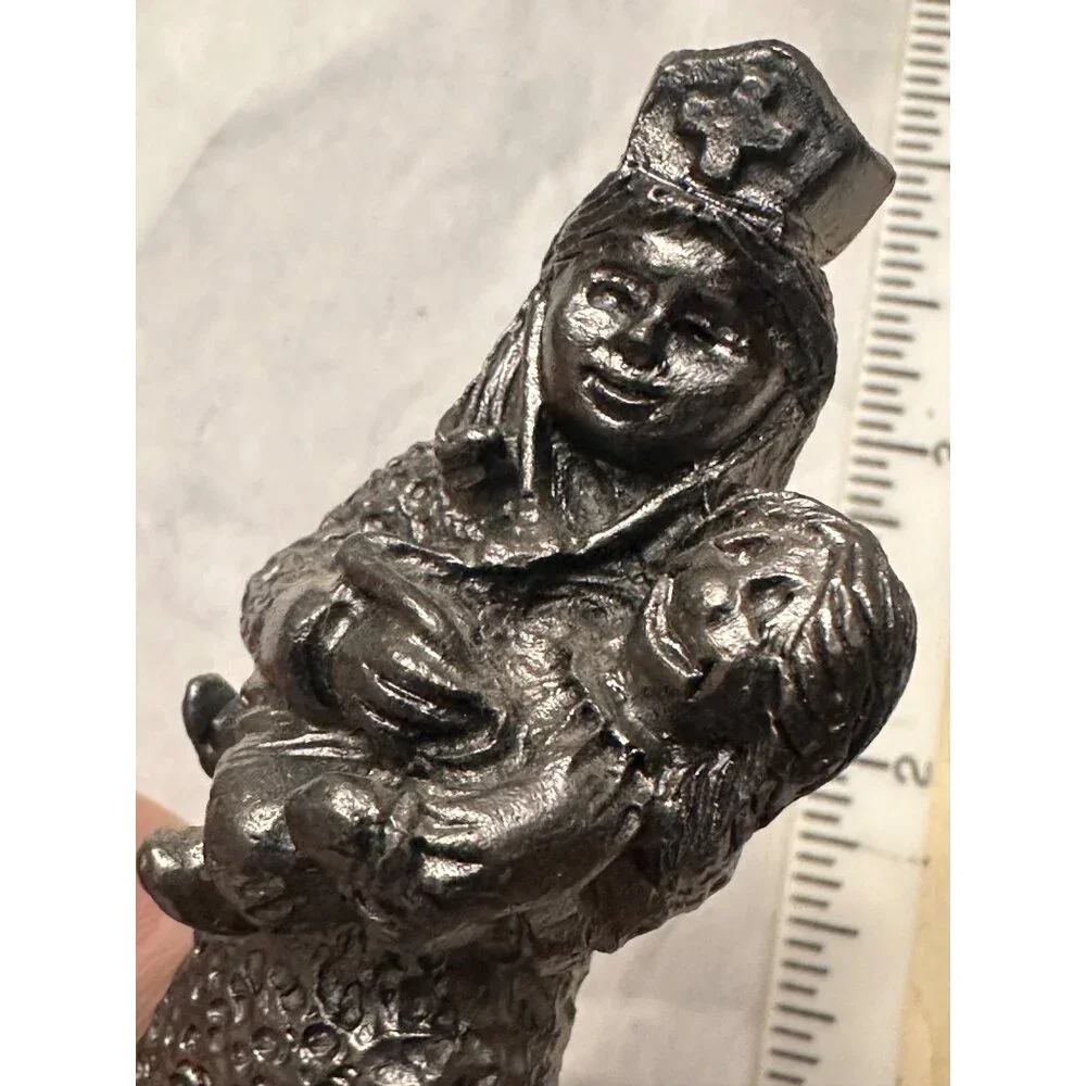 Michael‎ Ricker Pewter Nurse Sculpture Holding Child  Christmas
